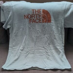 The North Face Sky Blue Tee with Rust Logo